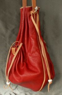 16th/17th century ladies draw string purse with two side pockets and piped seams