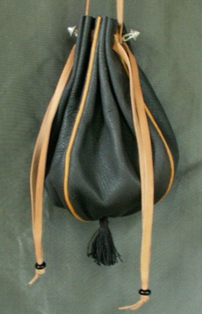 Ladies 14th/17th century round drawstring purse with piped seams and a tassel