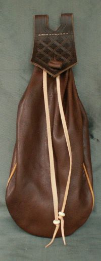 15th/16th century narrow belt bag with piped seams and tooling