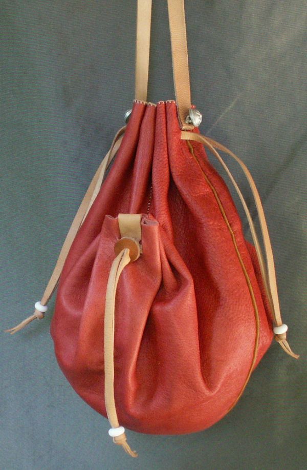 16th/17th century ladies draw string purse with two side pockets and piped seams