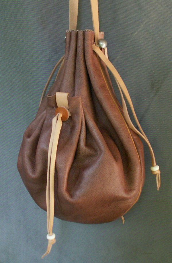 16th/17th century ladies draw string purse with two side pockets and piped seams