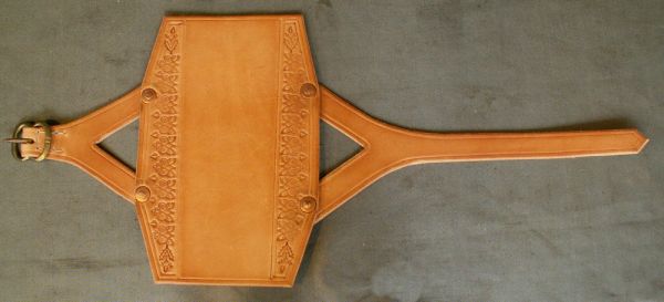 Standard size archery bracer with tooling