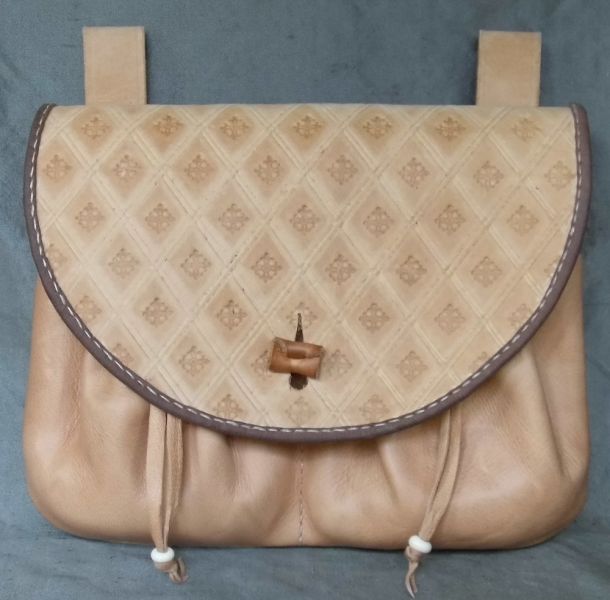 16th - 17th century medium belt wallet with a tooled round front and two pouchlets