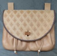 16th - 17th century medium belt wallet with a tooled round front and two pouchlets