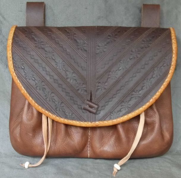 16th - 17th century medium belt wallet with a tooled round front and two pouchlets