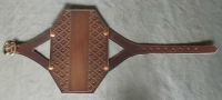 Standard size archery bracer with tooling
