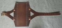 Standard size archery bracer with tooling